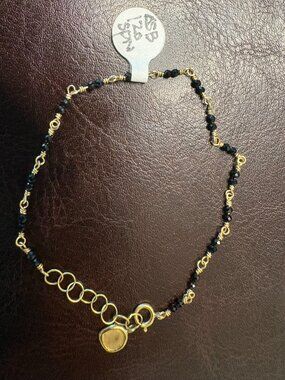 NWT! $1000 Anne Sportun 18K yellow gold and black spinel tied bracelet 6.5-7.5"